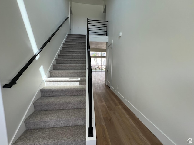 1148 N 1875 E Unit 2, Layton, UT 84040 - stairs featuring wood finished floors and a towering ceiling