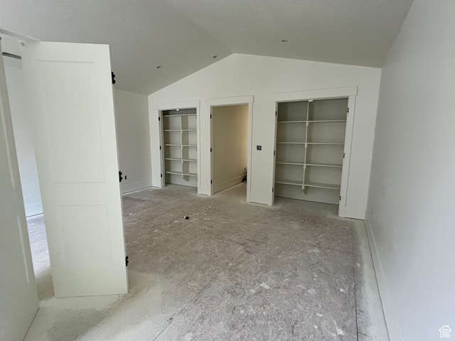 1148 N 1875 E Unit 2, Layton, UT 84040 - unfurnished bedroom with multiple closets and lofted ceiling