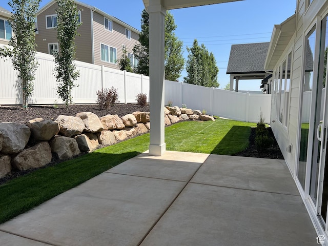 1148 N 1875 E Unit 2, Layton, UT 84040 - fenced backyard featuring a patio area