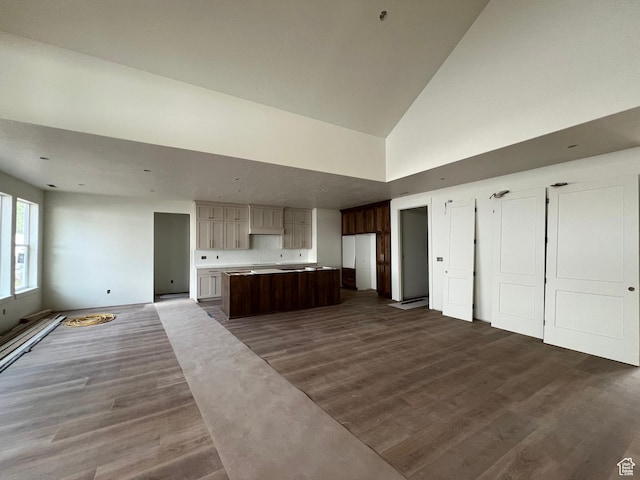 1148 N 1875 E Unit 2, Layton, UT 84040 - unfurnished living room with high vaulted ceiling and dark wood-type flooring