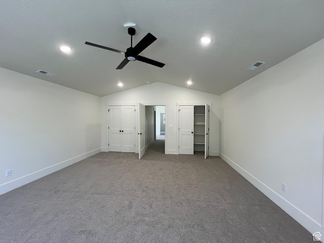 1148 N 1875 E Unit 2, Layton, UT 84040 - unfurnished bedroom featuring vaulted ceiling, recessed lighting, carpet flooring, two closets, and a ceiling fan