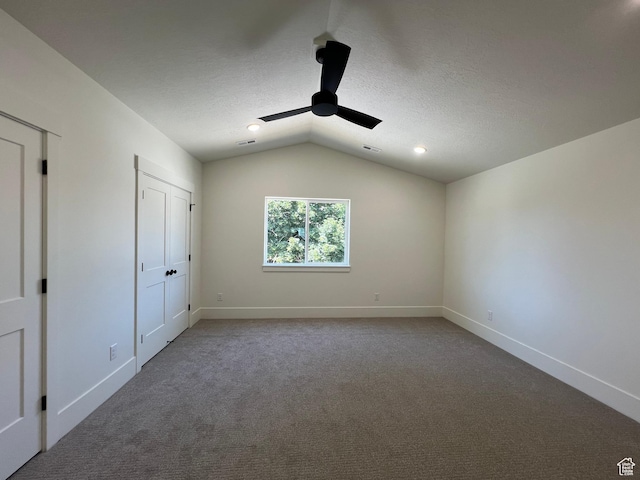 1148 N 1875 E Unit 2, Layton, UT 84040 - unfurnished bedroom featuring vaulted ceiling, carpet floors, a ceiling fan, a textured ceiling, and recessed lighting