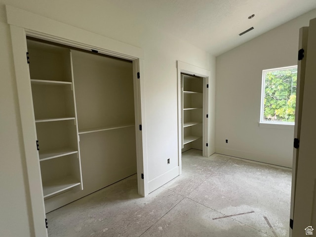 1148 N 1875 E Unit 2, Layton, UT 84040 - unfurnished bedroom featuring lofted ceiling and baseboards