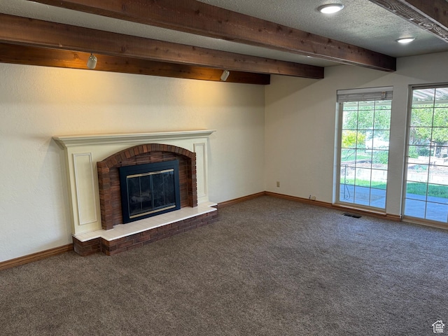 281 N Pin Oak Cir, Kaysville, UT 84037 - unfurnished living room featuring a fireplace, beamed ceiling, carpet floors, and visible vents