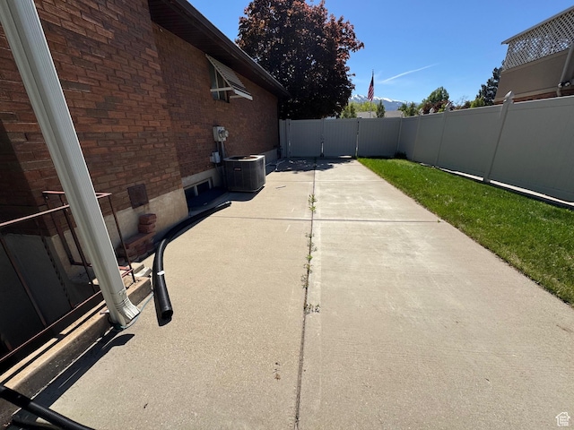 281 N Pin Oak Cir, Kaysville, UT 84037 - view of patio / terrace with central AC unit and fence