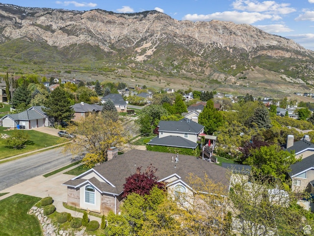 drone / aerial view with a mountain view and a residential view