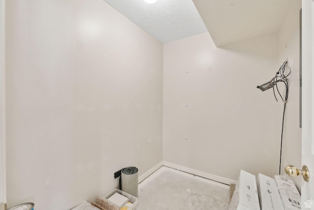 bathroom with baseboards