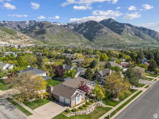 aerial view with a mountain view and a residential view