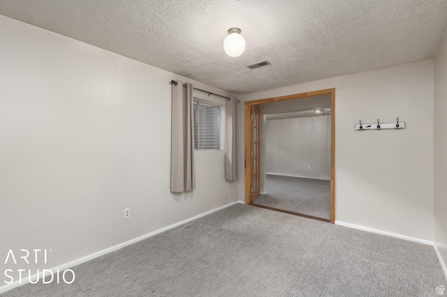 1314 E 1990 S, Ogden, UT 84401 - unfurnished bedroom featuring baseboards, a textured ceiling, visible vents, and carpet