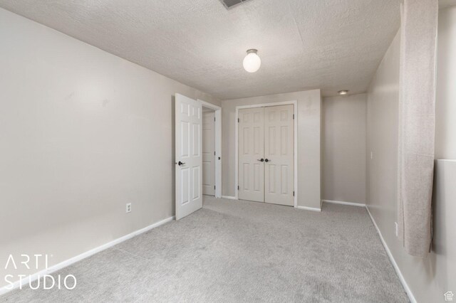 1314 E 1990 S, Ogden, UT 84401 - carpeted empty room with a textured ceiling and baseboards