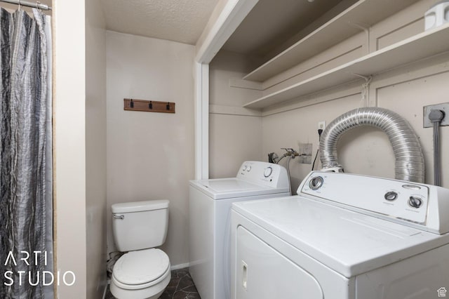 1314 E 1990 S, Ogden, UT 84401 - laundry area featuring baseboards, laundry area, a textured ceiling, and washer and clothes dryer