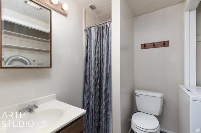 1314 E 1990 S, Ogden, UT 84401 - bathroom with toilet, curtained shower, a textured ceiling, washer / dryer, and vanity