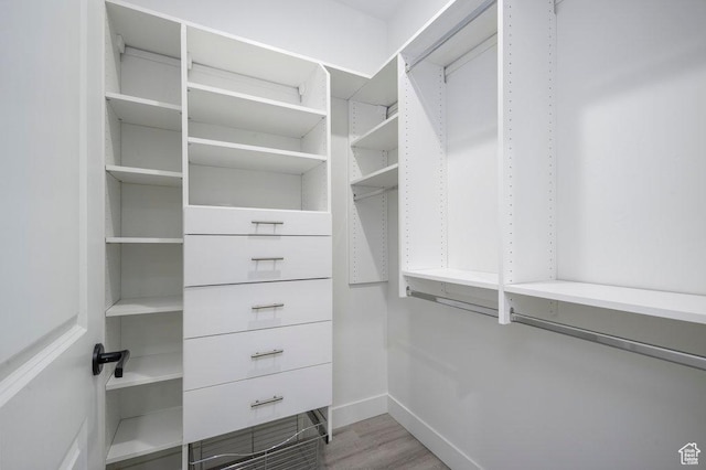 11056 S Lake Run Rd, South Jordan, UT 84009 - walk in closet with wood finished floors