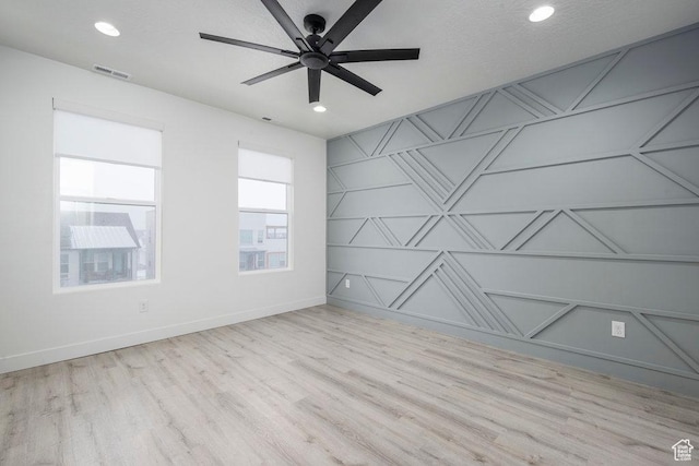 11056 S Lake Run Rd, South Jordan, UT 84009 - empty room with a ceiling fan, recessed lighting, baseboards, visible vents, and wood finished floors