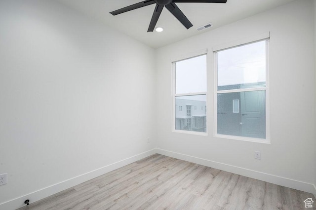 11056 S Lake Run Rd, South Jordan, UT 84009 - spare room featuring baseboards, a ceiling fan, visible vents, and wood finished floors
