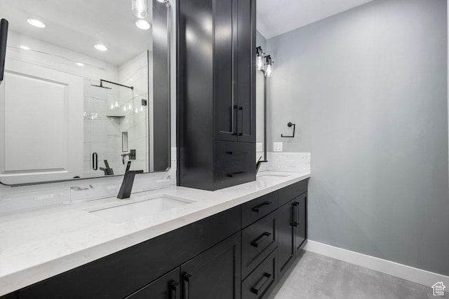 11056 S Lake Run Rd, South Jordan, UT 84009 - full bath with recessed lighting, baseboards, a sink, a shower stall, and double vanity