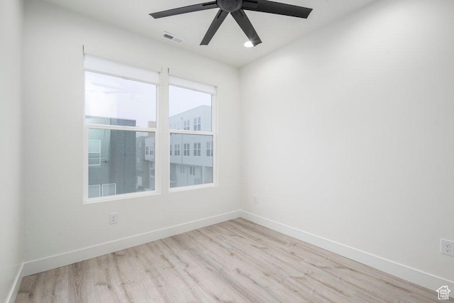 11056 S Lake Run Rd, South Jordan, UT 84009 - empty room featuring ceiling fan, baseboards, visible vents, and wood finished floors