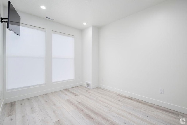 11056 S Lake Run Rd, South Jordan, UT 84009 - unfurnished room featuring baseboards, recessed lighting, visible vents, and wood finished floors