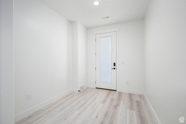 11056 S Lake Run Rd, South Jordan, UT 84009 - empty room featuring light wood-style floors, visible vents, and baseboards