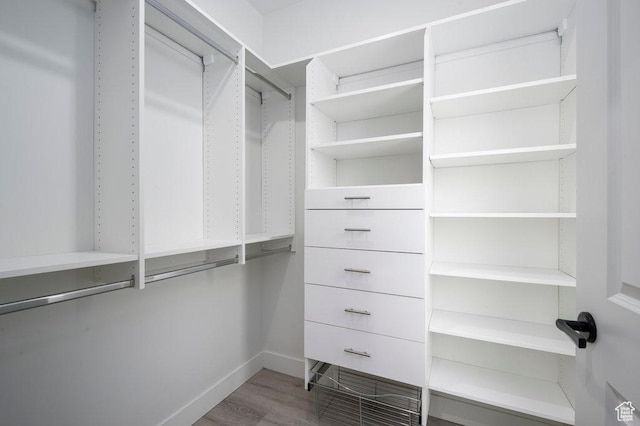 11056 S Lake Run Rd, South Jordan, UT 84009 - walk in closet featuring wood finished floors