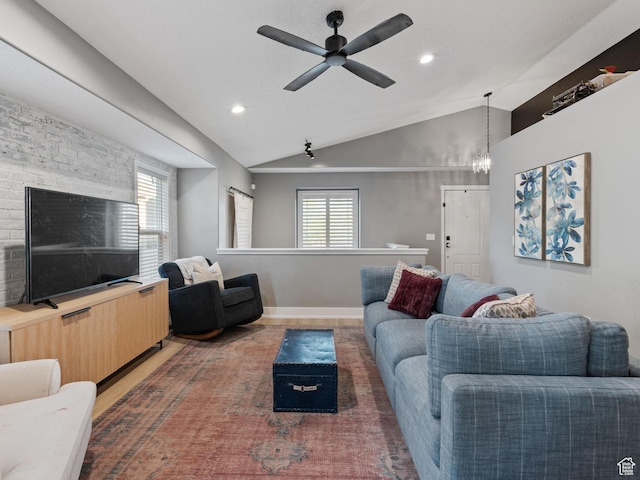 4529 W Gladstone Cir, Riverton, UT 84096 - living room featuring lofted ceiling, ceiling fan with notable chandelier, baseboards, and recessed lighting