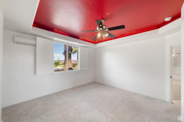 2996 S Limestone Dr, St George, UT 84790 - carpeted spare room with ceiling fan, baseboards, a raised ceiling, and a wall unit AC