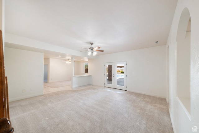 2996 S Limestone Dr, St George, UT 84790 - unfurnished room featuring light colored carpet, french doors, and ceiling fan