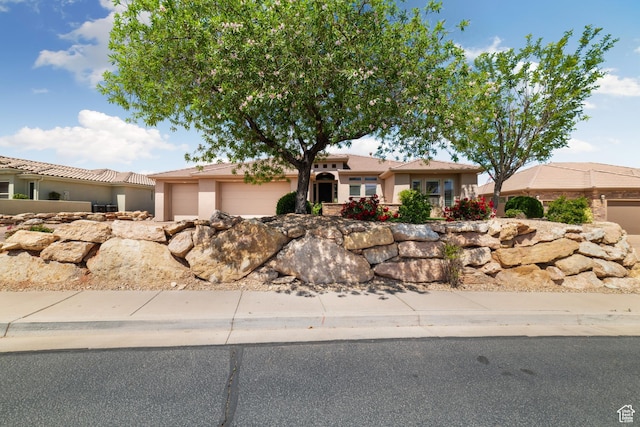 2996 S Limestone Dr, St George, UT 84790 - ranch-style house featuring a garage and stucco siding
