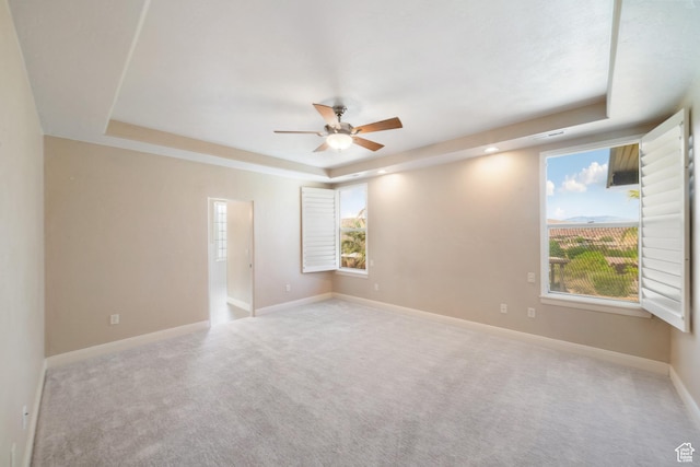 2996 S Limestone Dr, St George, UT 84790 - carpeted spare room with ceiling fan, a raised ceiling, and baseboards