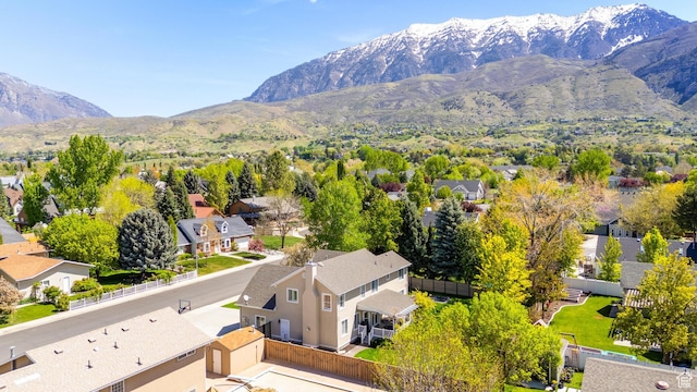 bird's eye view featuring a residential view and a mountain view