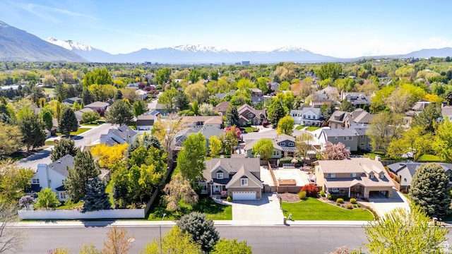drone / aerial view with a mountain view and a residential view