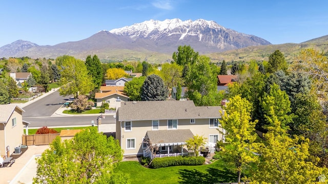 bird's eye view featuring a mountain view and a residential view
