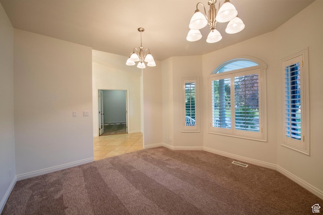 105 S 400 E, Hyde Park, UT 84318 - carpeted spare room with visible vents, baseboards, and a notable chandelier