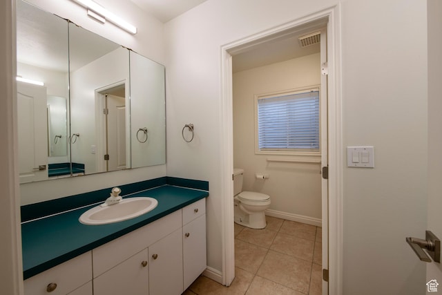 105 S 400 E, Hyde Park, UT 84318 - bathroom with toilet, baseboards, visible vents, tile patterned floors, and vanity