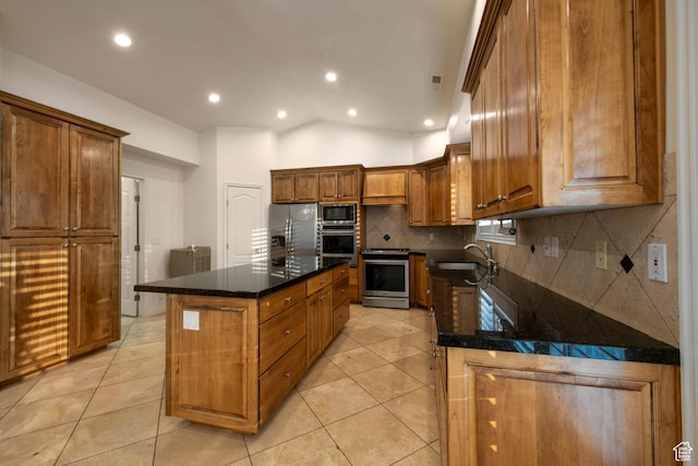 105 S 400 E, Hyde Park, UT 84318 - kitchen with light tile patterned floors, a sink, a kitchen island, backsplash, and stainless steel appliances