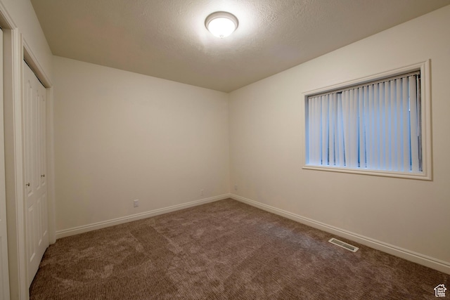 105 S 400 E, Hyde Park, UT 84318 - unfurnished bedroom featuring carpet floors, a closet, baseboards, and visible vents