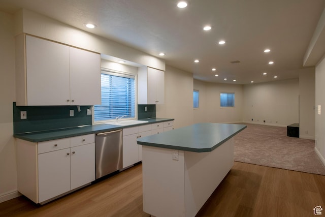 105 S 400 E, Hyde Park, UT 84318 - kitchen with white cabinets, dishwasher, light wood-type flooring, and a sink
