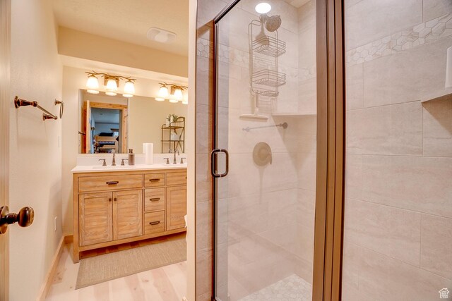 4571 Fawn Way, Heber City, UT 84032 - bathroom with double vanity, a shower stall, and a sink