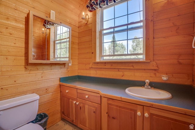 4571 Fawn Way, Heber City, UT 84032 - bathroom featuring toilet, wood walls, vanity, and visible vents