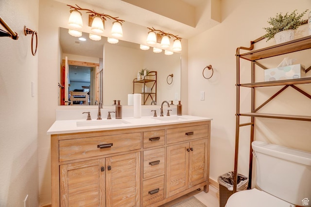 4571 Fawn Way, Heber City, UT 84032 - bathroom featuring double vanity, toilet, and a sink