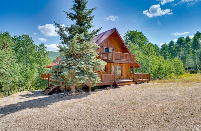 4571 Fawn Way, Heber City, UT 84032 - view of front facade with metal roof, a deck, and a balcony