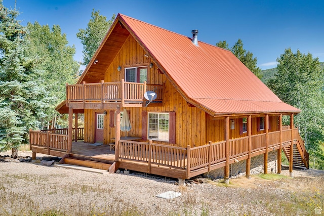 4571 Fawn Way, Heber City, UT 84032 - back of property with a balcony, metal roof, and board and batten siding