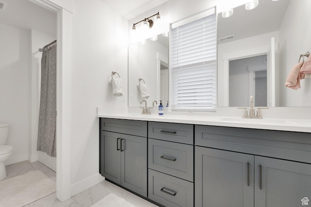 1281 Village Green Trl, Park City, UT 84098 - bathroom with toilet, marble finish floor, baseboards, a sink, and double vanity
