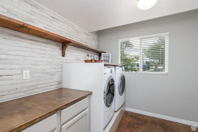 3391 W 1125 N, Layton, UT 84040 - laundry room featuring washing machine and dryer, baseboards, and a textured ceiling