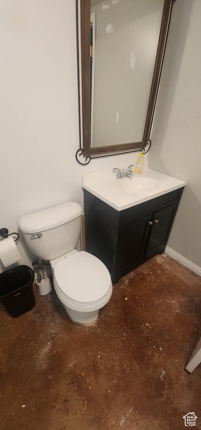 3391 W 1125 N, Layton, UT 84040 - half bathroom featuring vanity, toilet, concrete floors, and baseboards