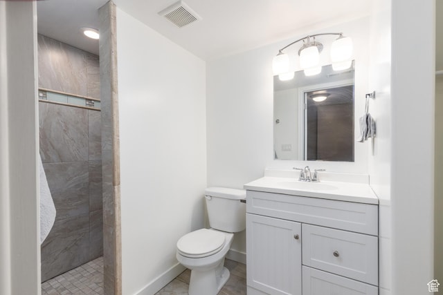 3391 W 1125 N, Layton, UT 84040 - full bath featuring a tile shower, toilet, vanity, and baseboards