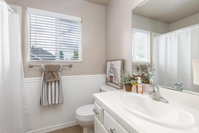 3391 W 1125 N, Layton, UT 84040 - full bath featuring a wainscoted wall, vanity, toilet, and a shower with shower curtain