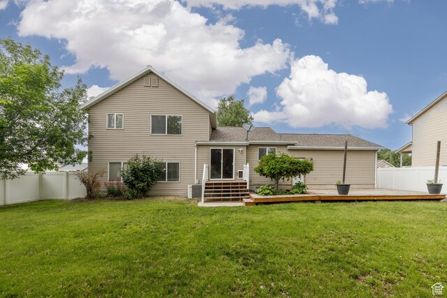 3391 W 1125 N, Layton, UT 84040 - rear view of property featuring a deck and a shingled roof