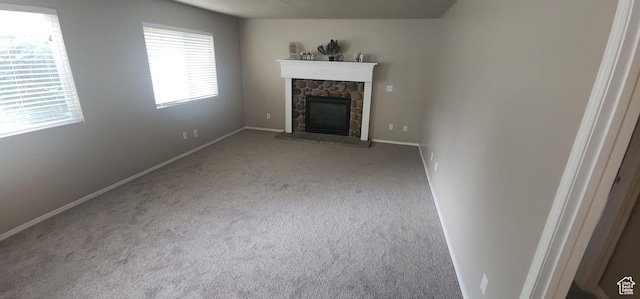 3391 W 1125 N, Layton, UT 84040 - unfurnished living room with carpet, a fireplace, and baseboards