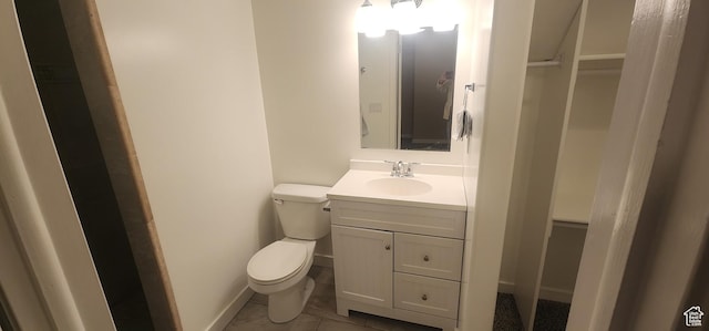 3391 W 1125 N, Layton, UT 84040 - bathroom featuring toilet, vanity, baseboards, and tile patterned floors
